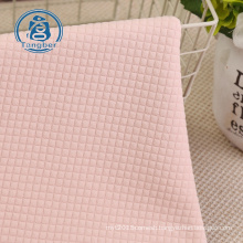 new design 100 polyester diamond check knitting jacquard fabric for cushion cover home textile
